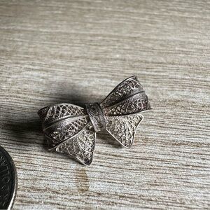 Elegant Silver Bow Brooch